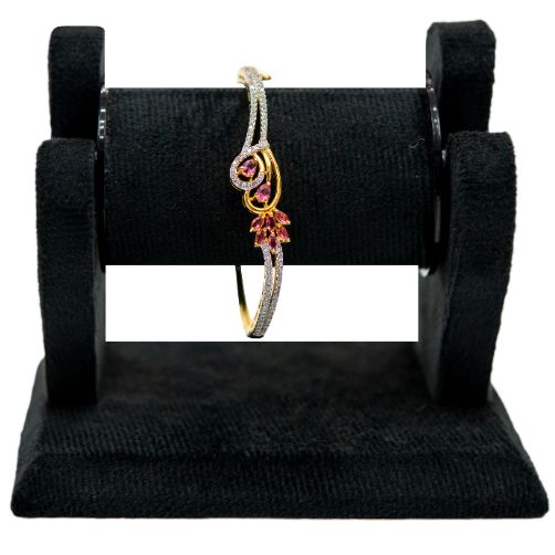 Gold Bracelet with Pink Stone Detailing